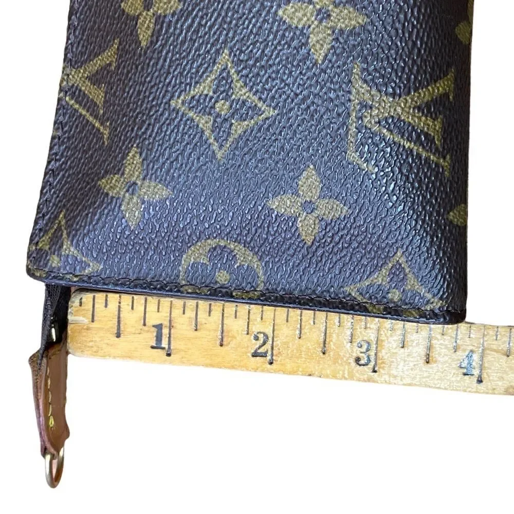 Louis Vuitton Classic Monogram zippered Pochette logo leather tan brass loop